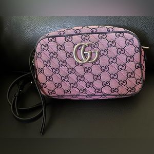 Pink and black crossbody Gucci purse